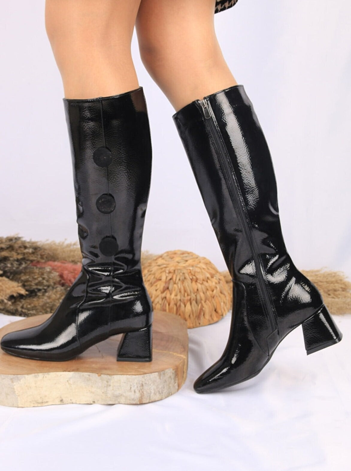 buttoned patent leather knee high boots