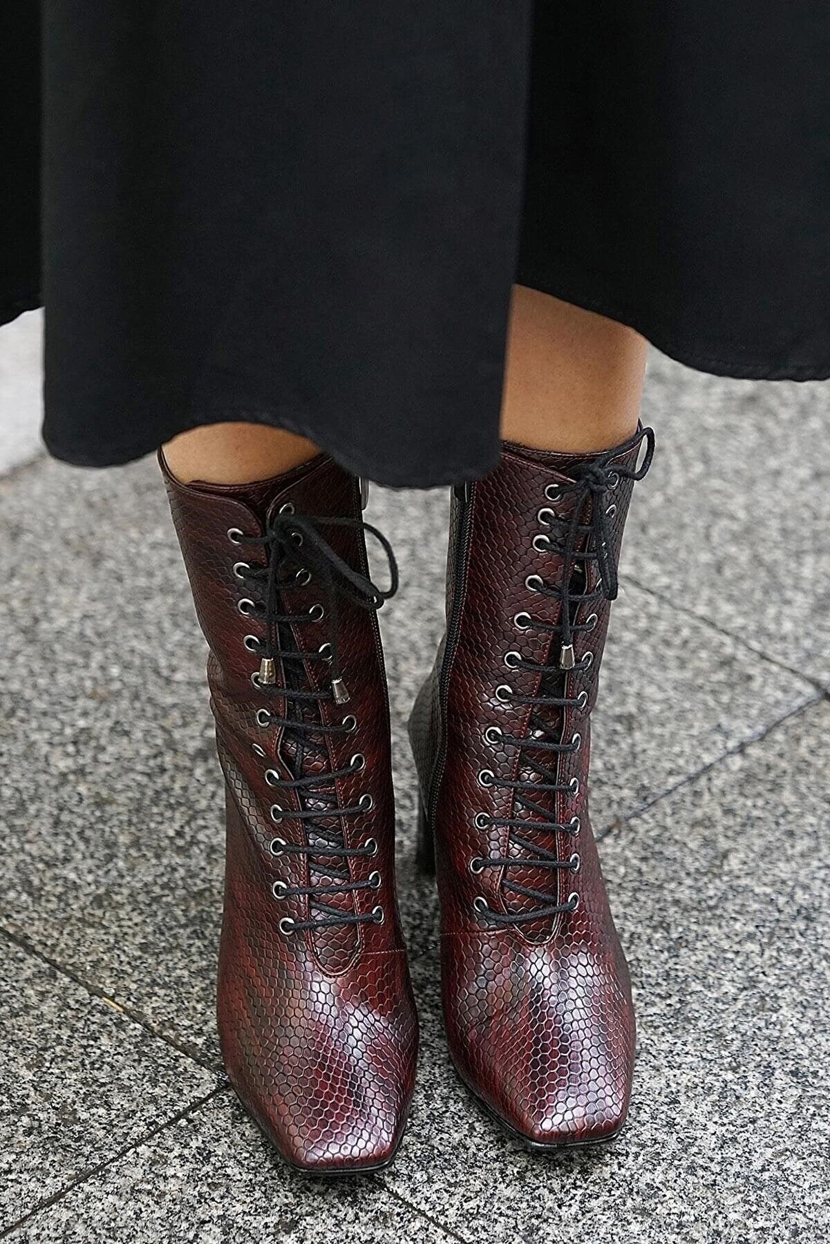 snake printed lace up boots
