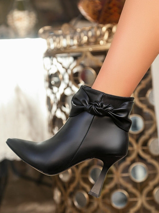 pointed toe heeled boots
