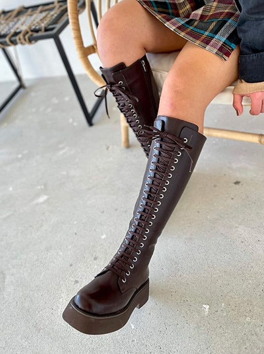 high-knee brown combat boots